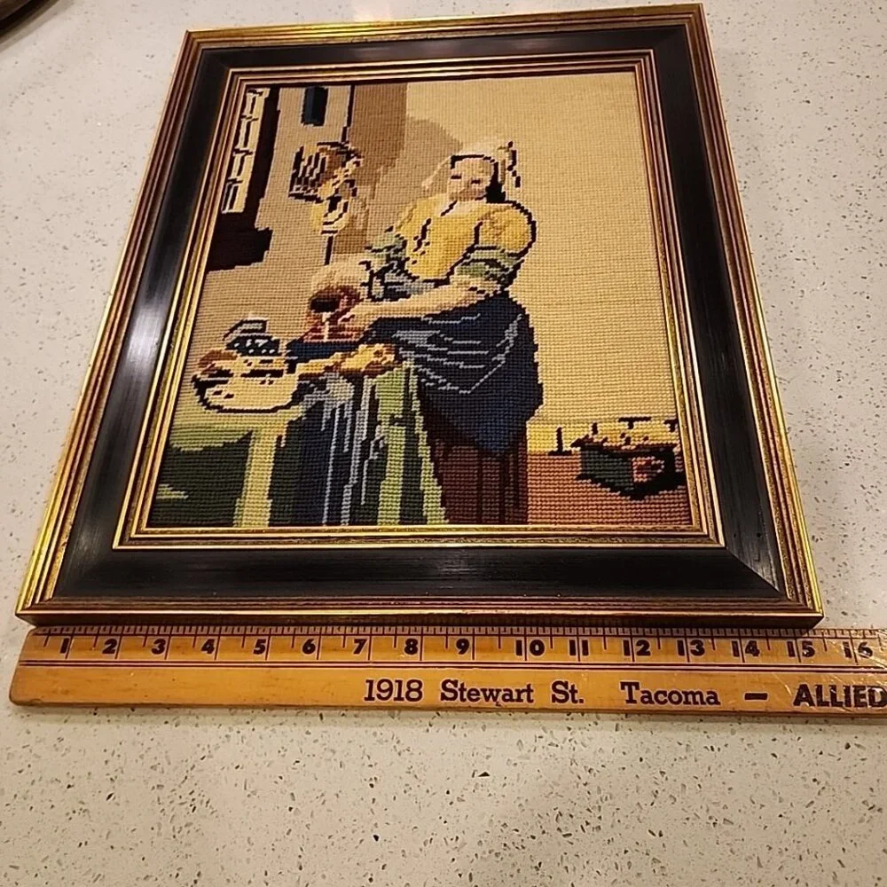 Vintage framed needlepoint reproduction of Rembrandt art Milkmaid 18x15